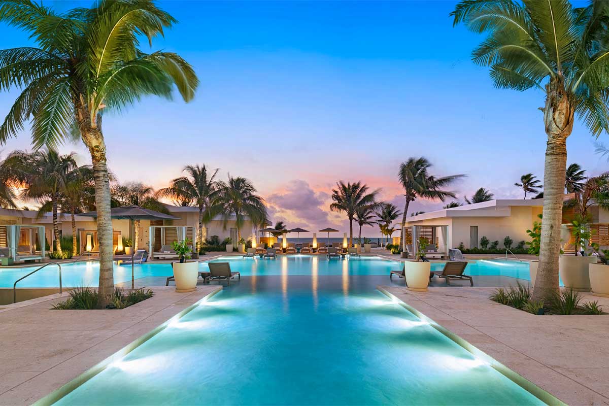 Alaia Belize Luxury swimming pool and resort amenities at Alaia Belize, one of the best all-inclusive resorts in Ambergris Caye, featuring ocean views and tropical elegance.
