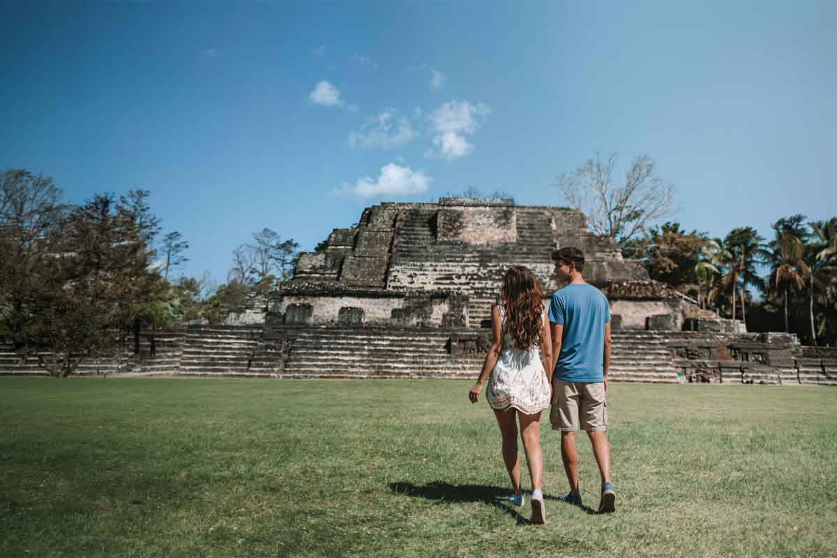 Private Archaeological Experiences - Authentic Travel Belize Couple visiting a Maya archaeological site with private guiding during a Belize luxury and boutique travel journey.